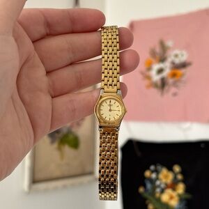 Vintage gold tone citizen dainty ladies watch